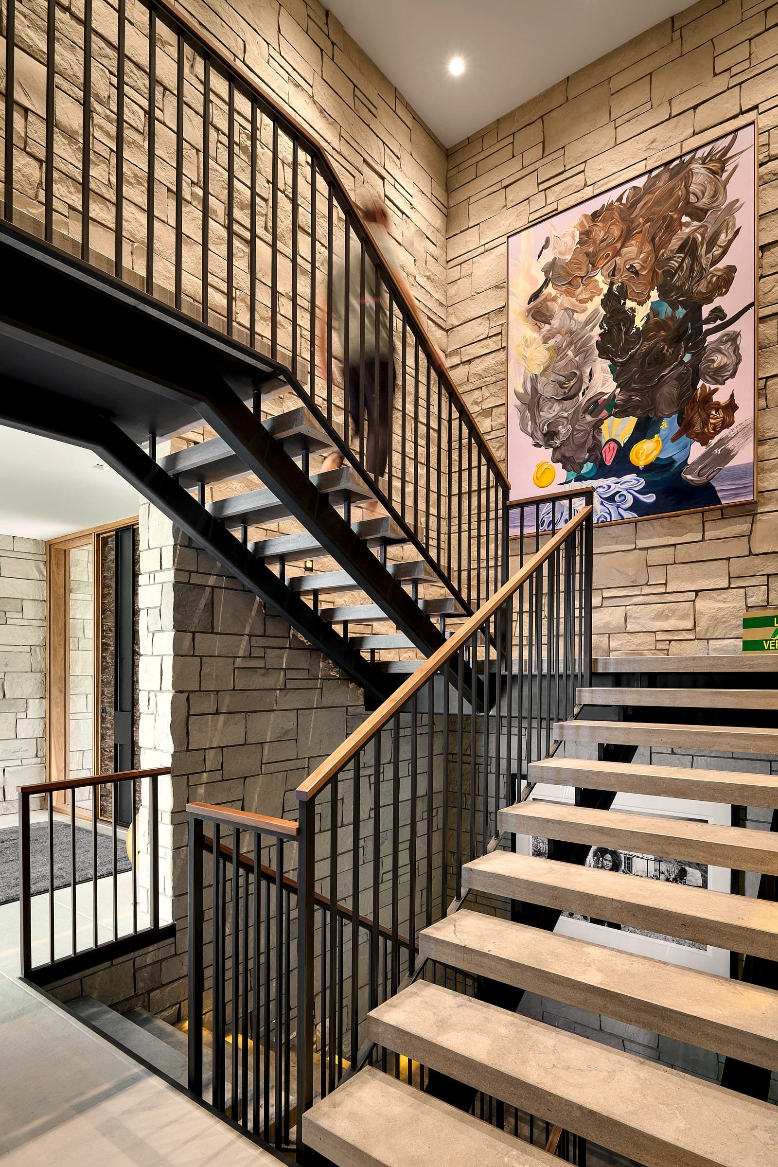 Grand staircase in luxury home — technology integrated seamlessly