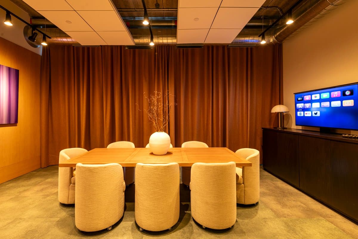 Conference room with integrated display and ambient lighting