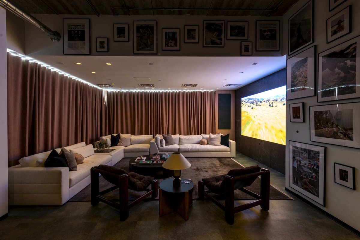 Private theater with cinematic projection and mood lighting