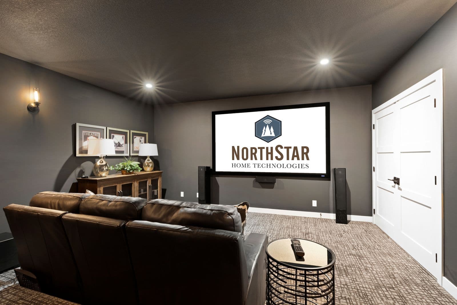 Home theater displaying NorthStar logo with leather seating and surround sound