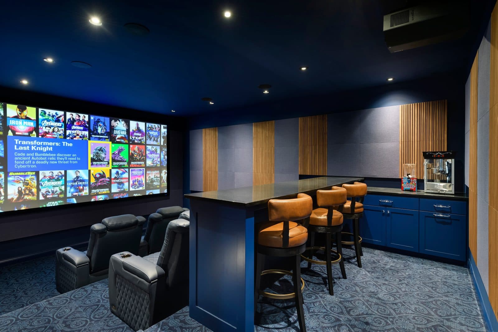Luxury home theater with immersive surround sound and large format display