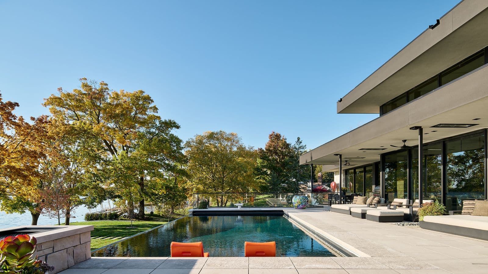 Outdoor living space with automated lighting, audio, and motorized systems